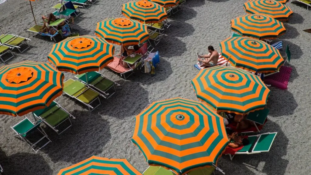 Monterosso beach early morning umbrellas